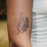 Jaguar auf einem Baum Tattoo