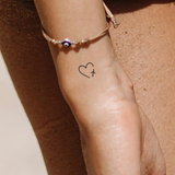 Herz mit Flugzeug Tattoo