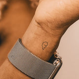 Kleiner Stegosaurus Tattoo