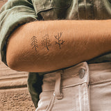 Drei kleine Bäume Tattoo