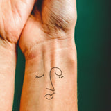 Abstraktes Gesicht Tattoo