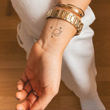 Saturn 2-Week-Tattoo Inkster