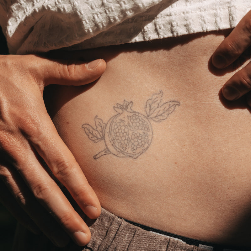 Granatapfel Tattoo